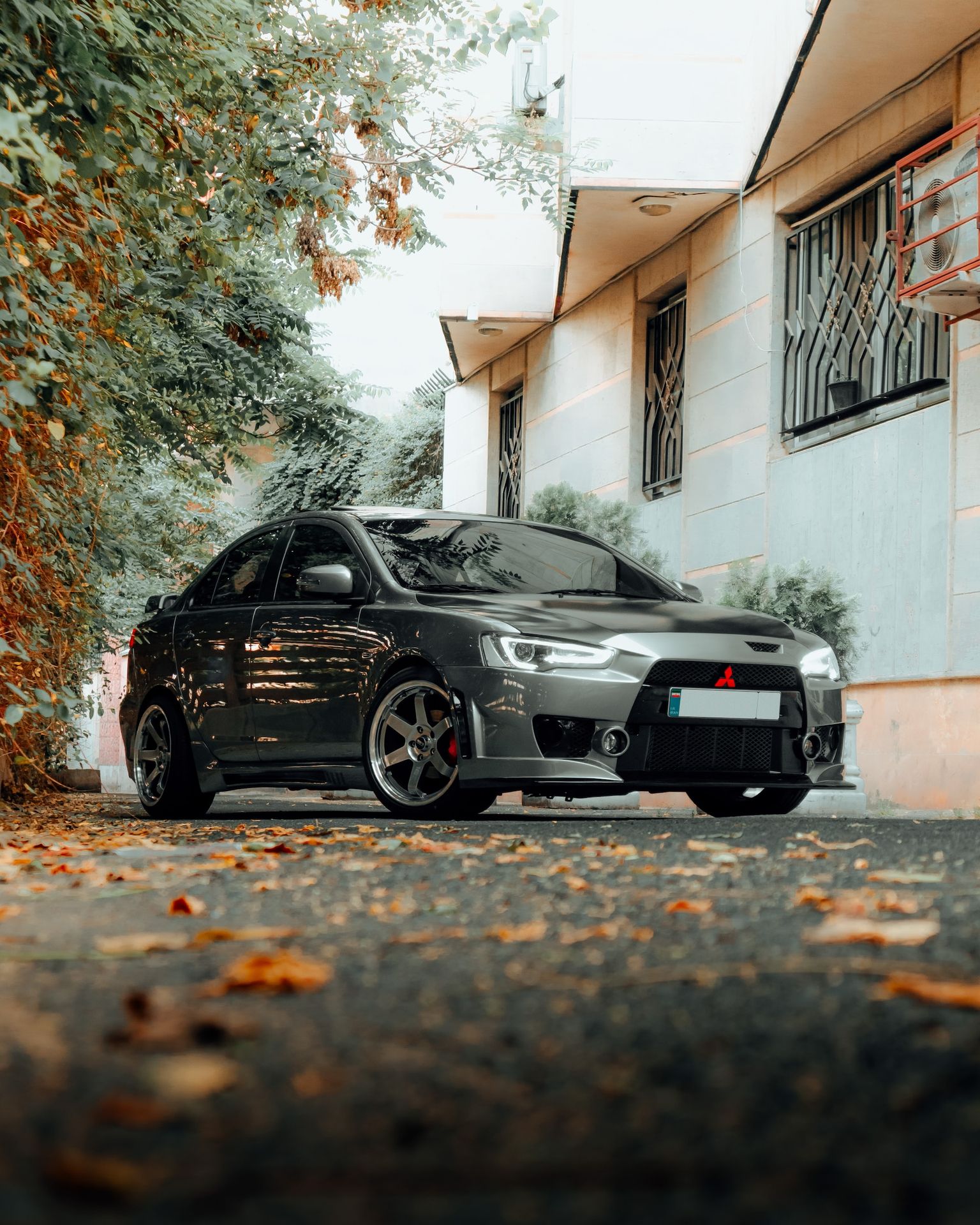 a black car parked on a street